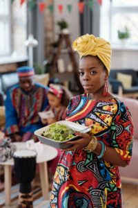 A festive gathering featuring vibrant traditional attire and cuisine. Perfect for holiday and cultural themes.